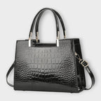 Léora. -  Glänzende Krokodilledermuster-Handtasche